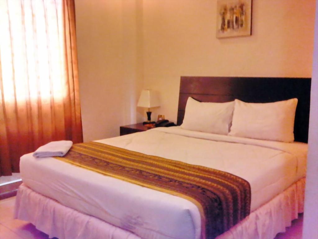 Grand Duta Hotel Palu Zimmer foto